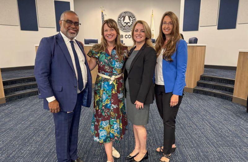 Timko (second from left) with collaborators at Cobb County, Georgia, where Parallel’s school-based workforce development programs have taken root.