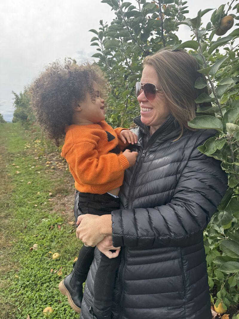 Pinney with her toddler at an orchard in New England.