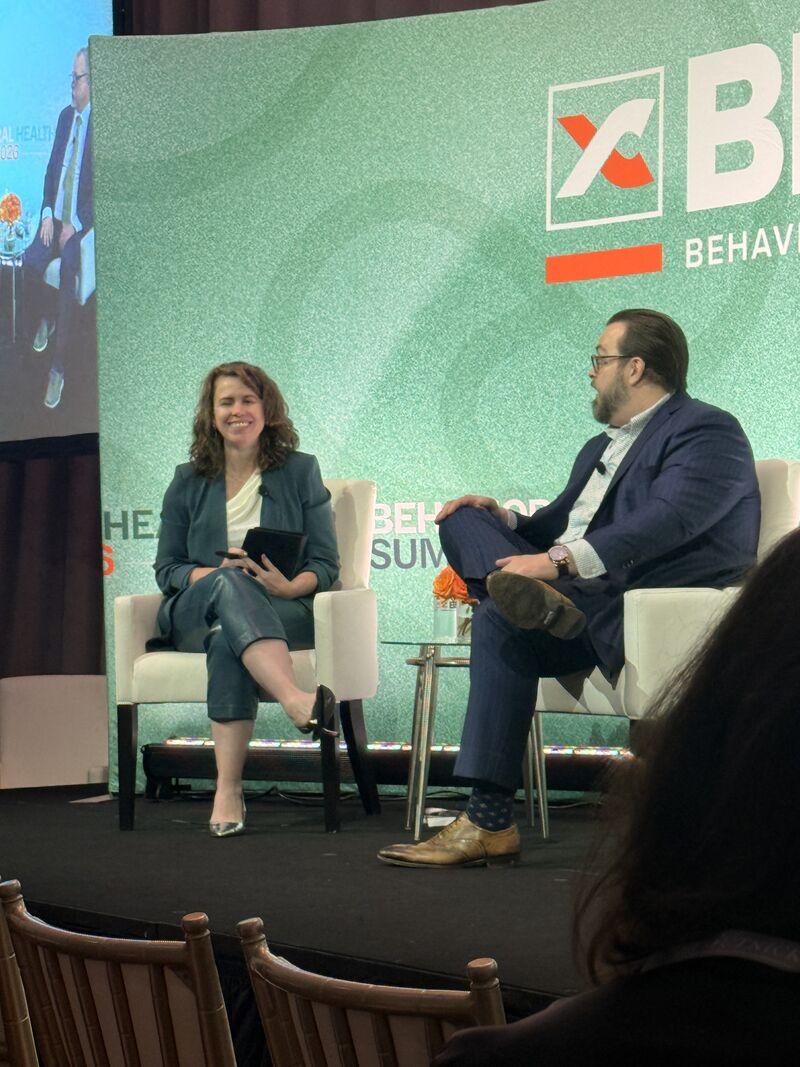 Pinney on stage at the Behavioral Health Summit, BHASE 26, Miami, February 2026.
