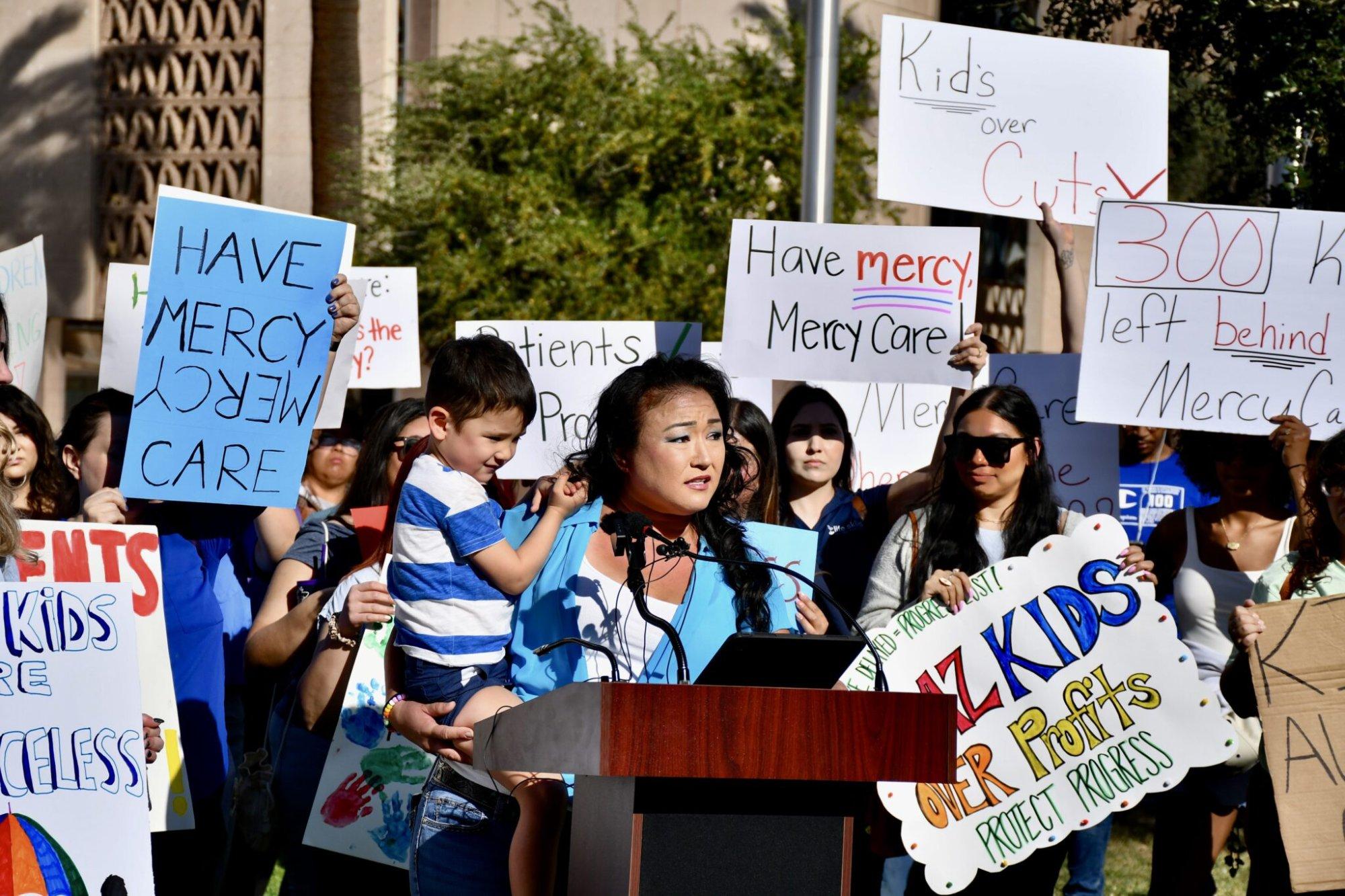 A mother addresses the crowd at the March 5, 2026 Arizona Capitol rally