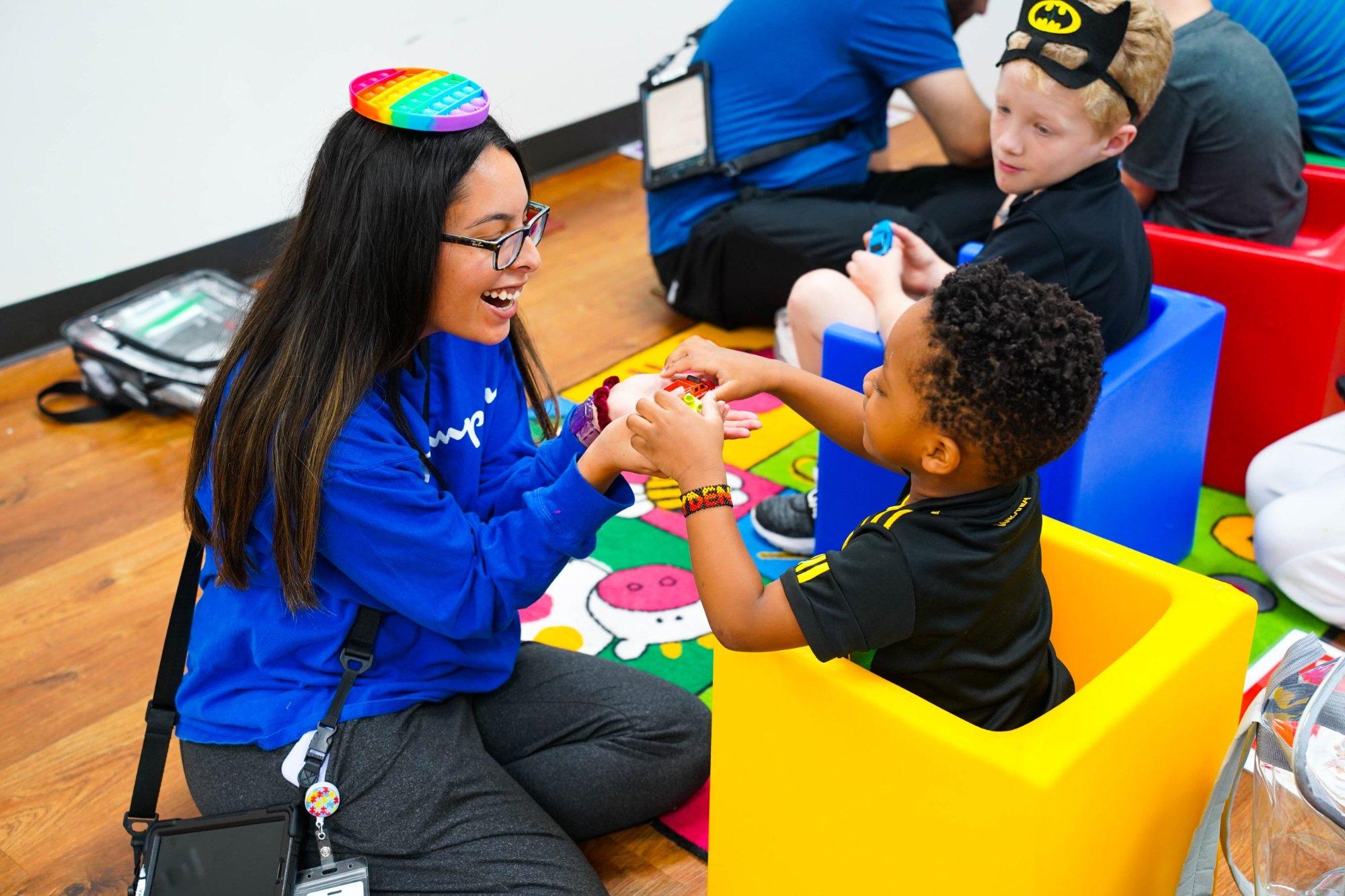 A Behavioral Innovations behavior technician in a center-based therapy session