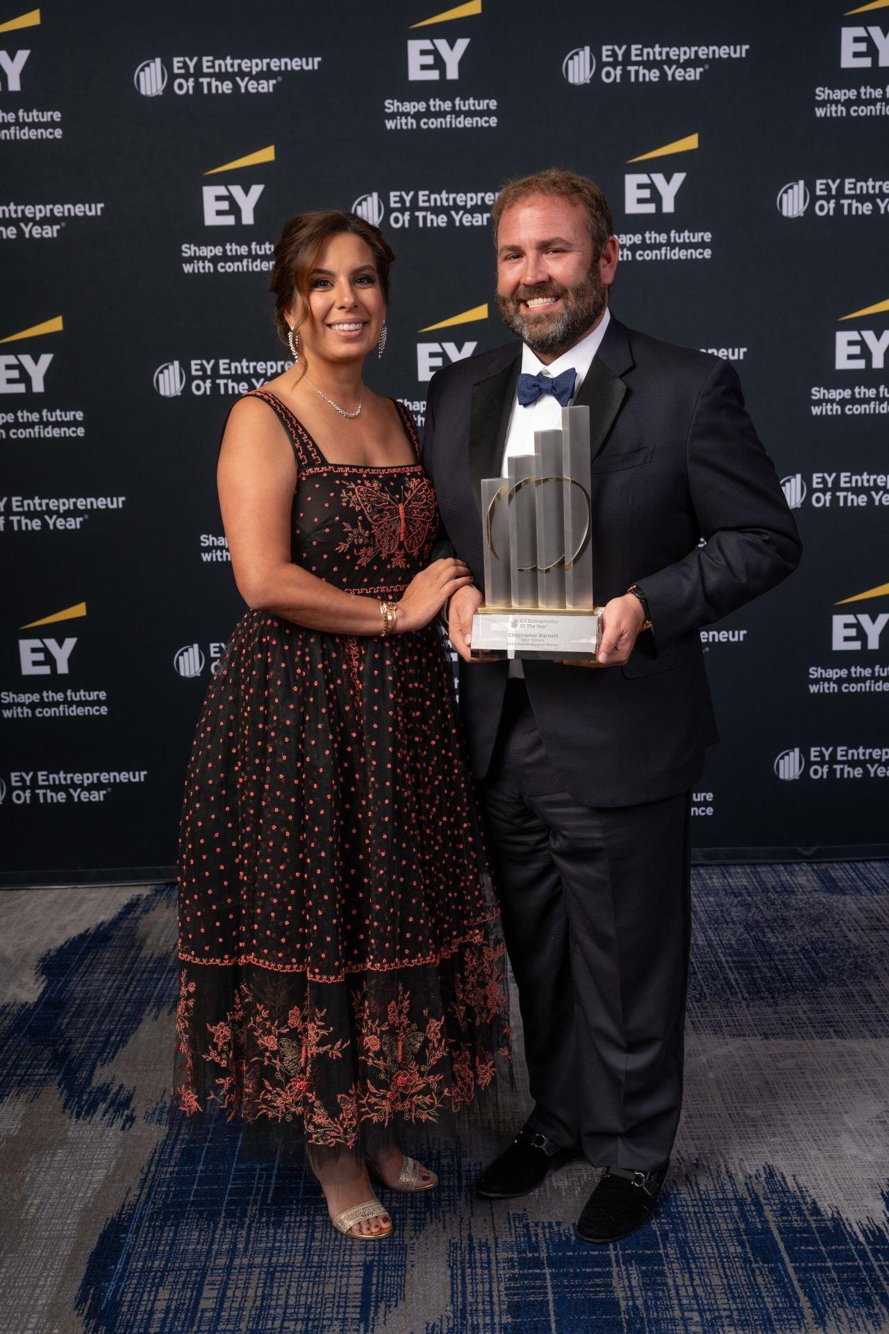 Christopher Barnett and his wife Julie with the 2024 EY Entrepreneur of the Year National Overall Award