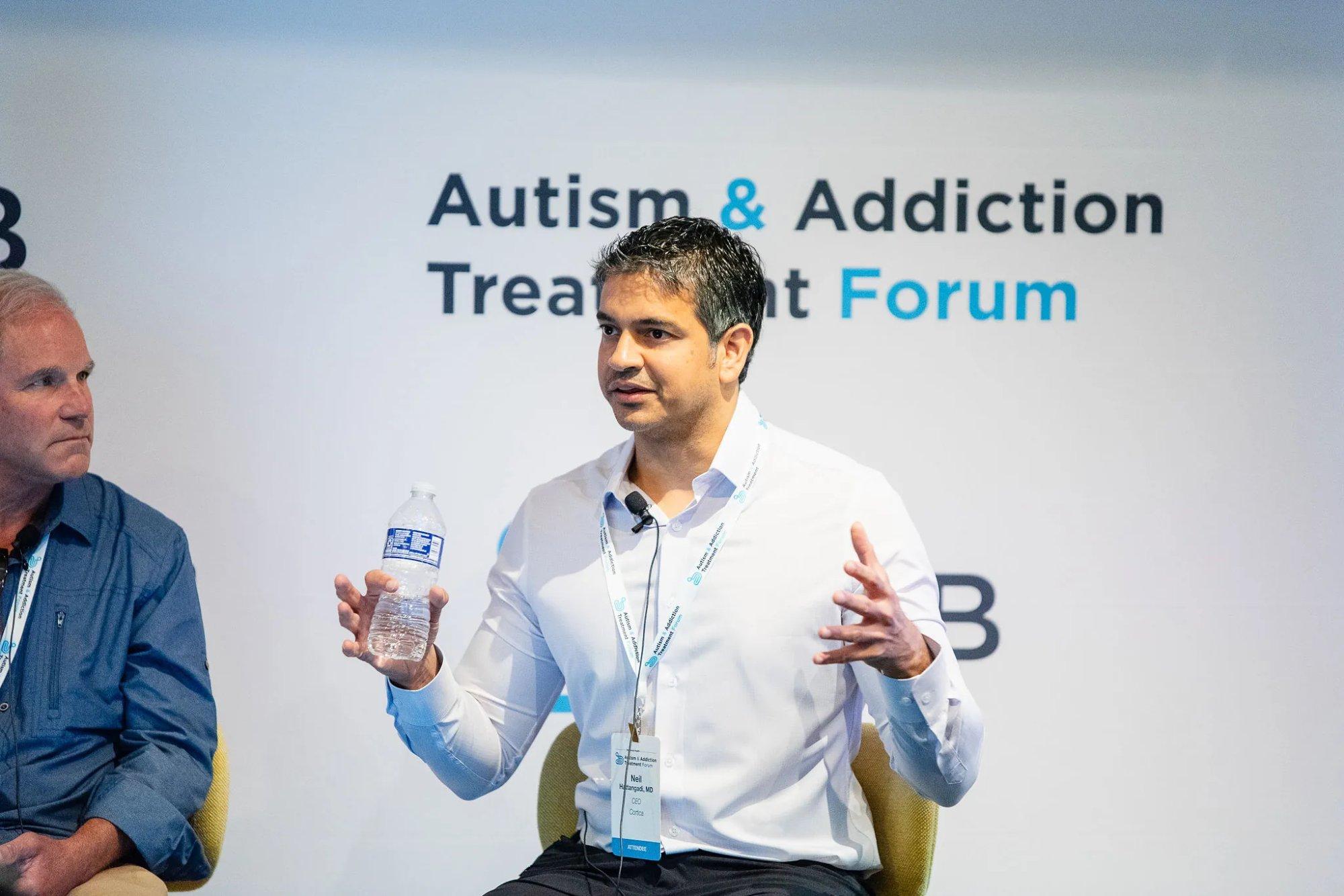 Neil Hattangadi, MD, speaking at the Autism & Addiction Treatment Forum