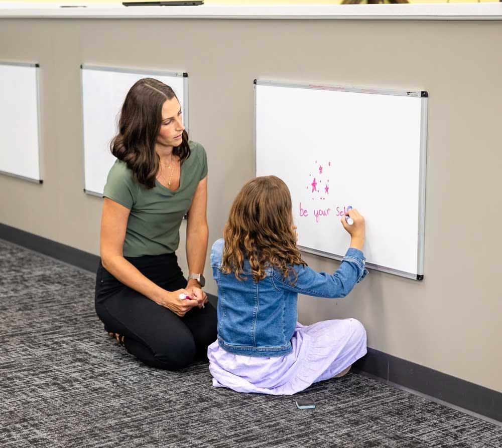 A Lighthouse therapist working with a child in a center-based session