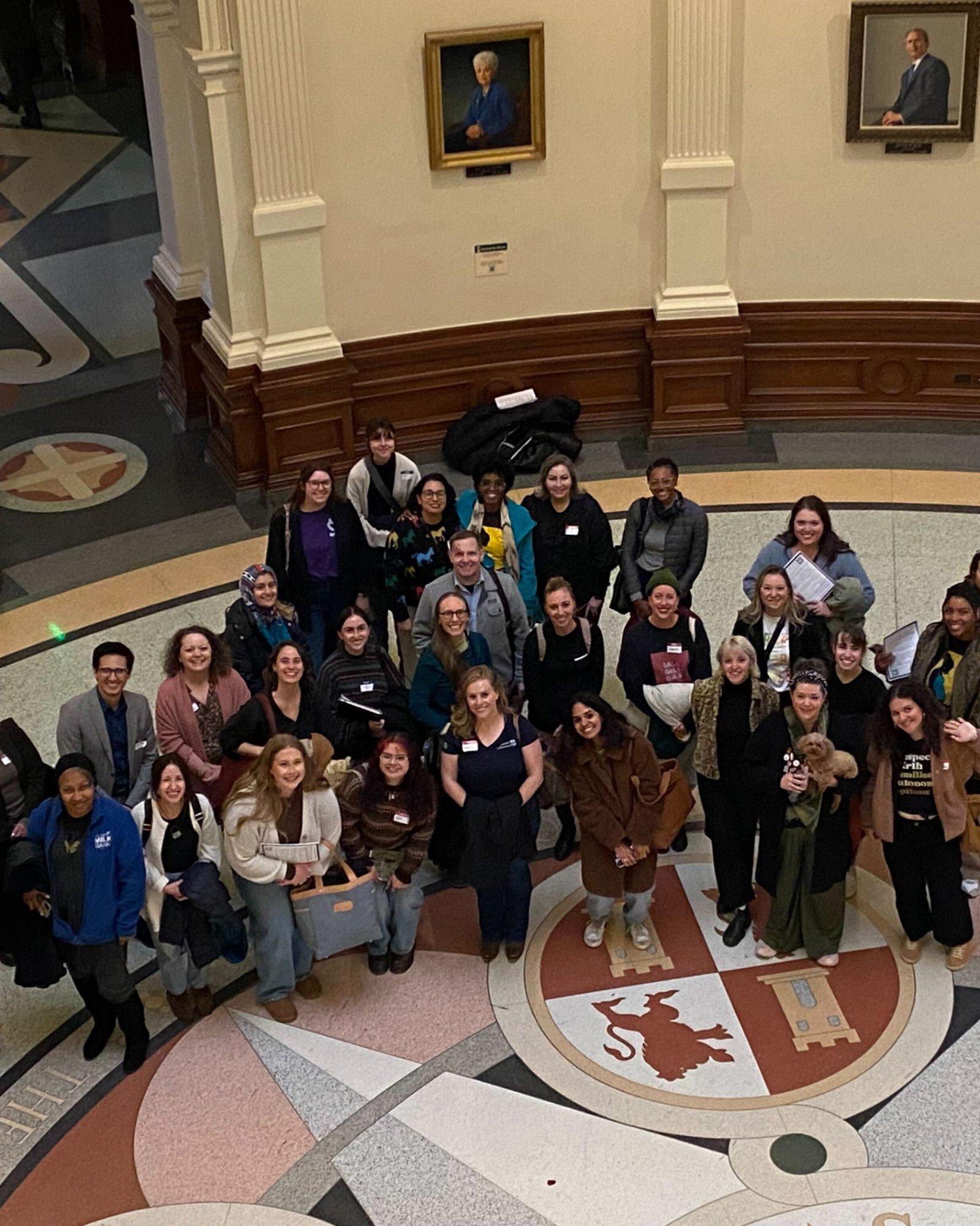 Autism advocates gather inside the Texas State Capitol during an advocacy day