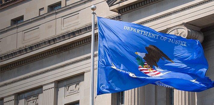The Department of Justice flag flies outside the Robert F. Kennedy Building in Washington, D.C. The DOJ Health Care Fraud Strike Force has charged more than 5,400 defendants since 2007 for schemes billing Medicare, Medicaid, and private insurers. ABA providers are among the newest additions to its enforcement portfolio.