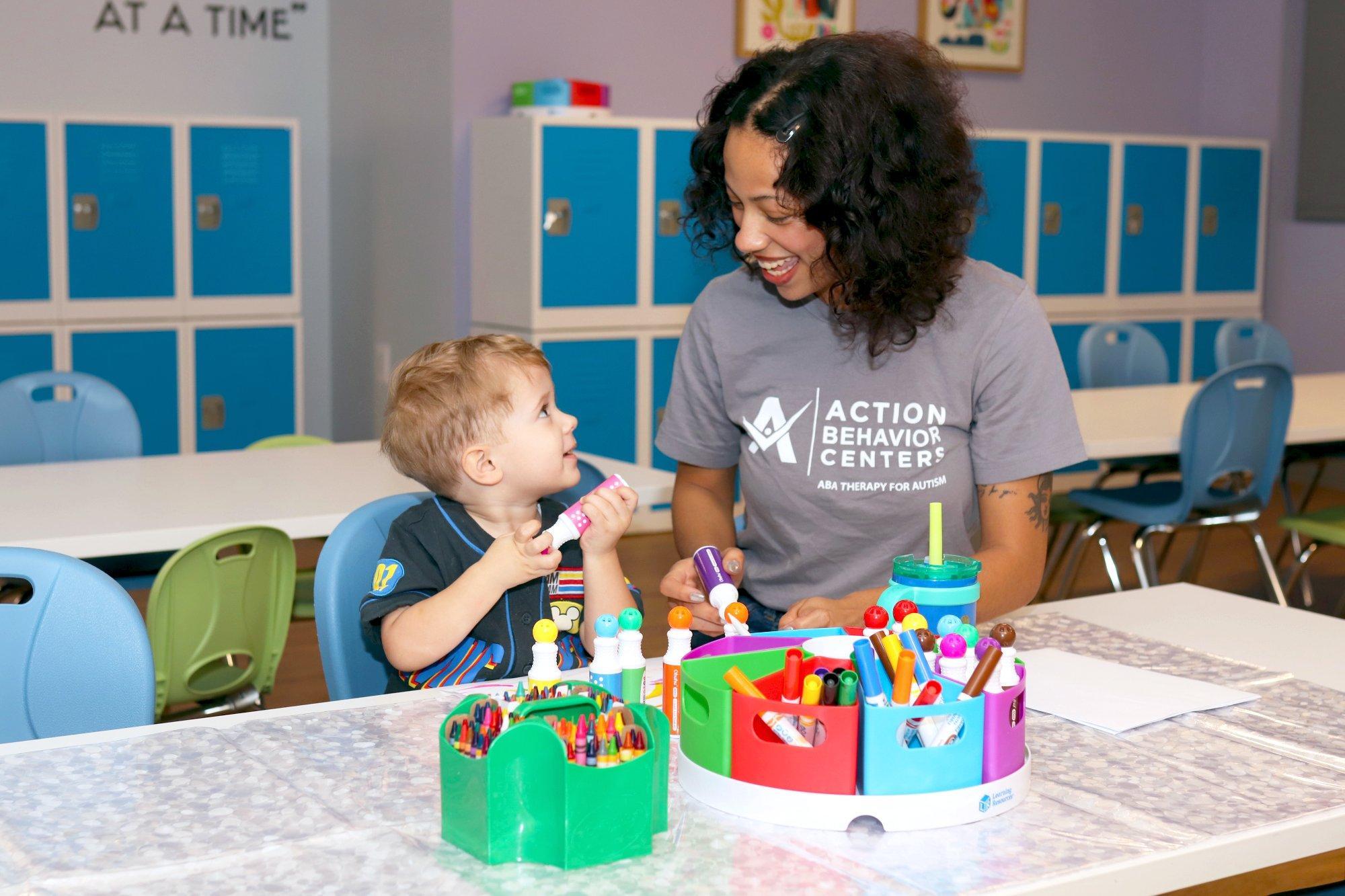 An Action Behavior Centers therapist works one-on-one with a child. ABC Academy extends this individualized approach into a school-readiness framework for children ages 5–12.