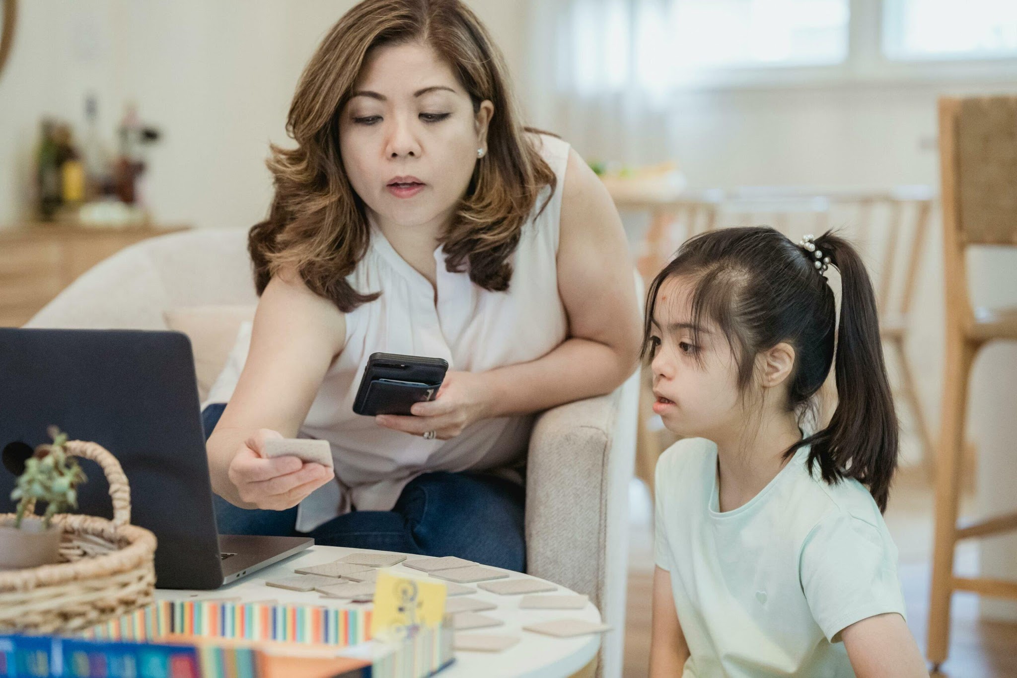 The parent-mediated therapy model trains caregivers to reinforce ABA skills during everyday interactions at home, extending therapeutic impact beyond the 4–5 weekly hours of scheduled virtual sessions.
