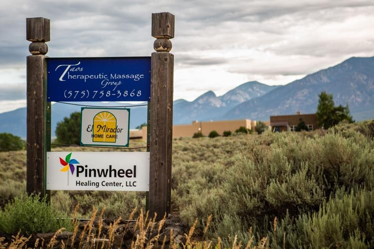 Roadside signage in northern New Mexico reflects the scattered, small-operator reality of rural healthcare across the state. BCI was founded in Alamogordo to serve communities where no ABA clinic had otherwise reached, building its model around telehealth from the start.