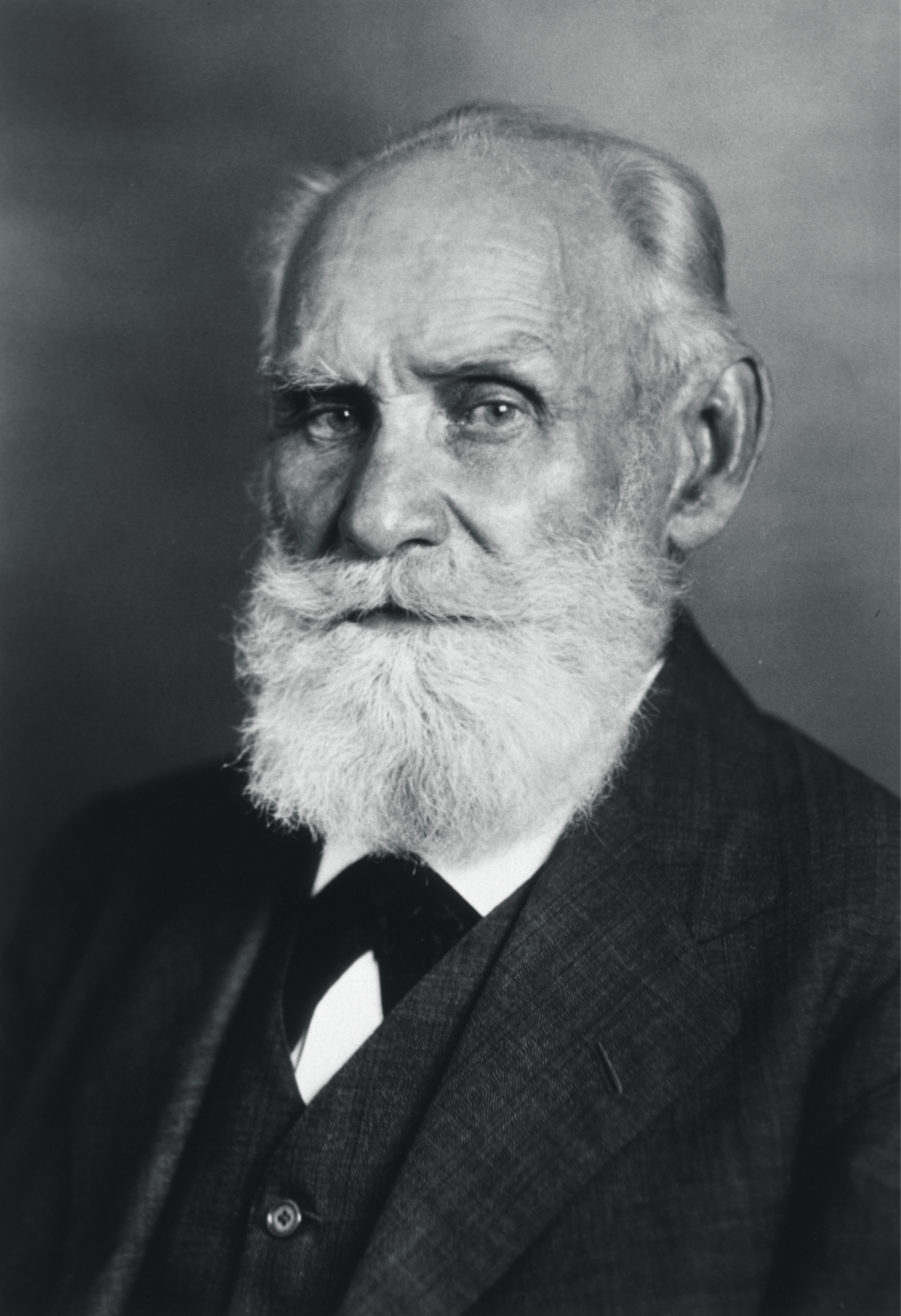 Ivan Pavlov, whose Conditioned Reflexes helped turn Skinner from fiction toward a science of behavior.